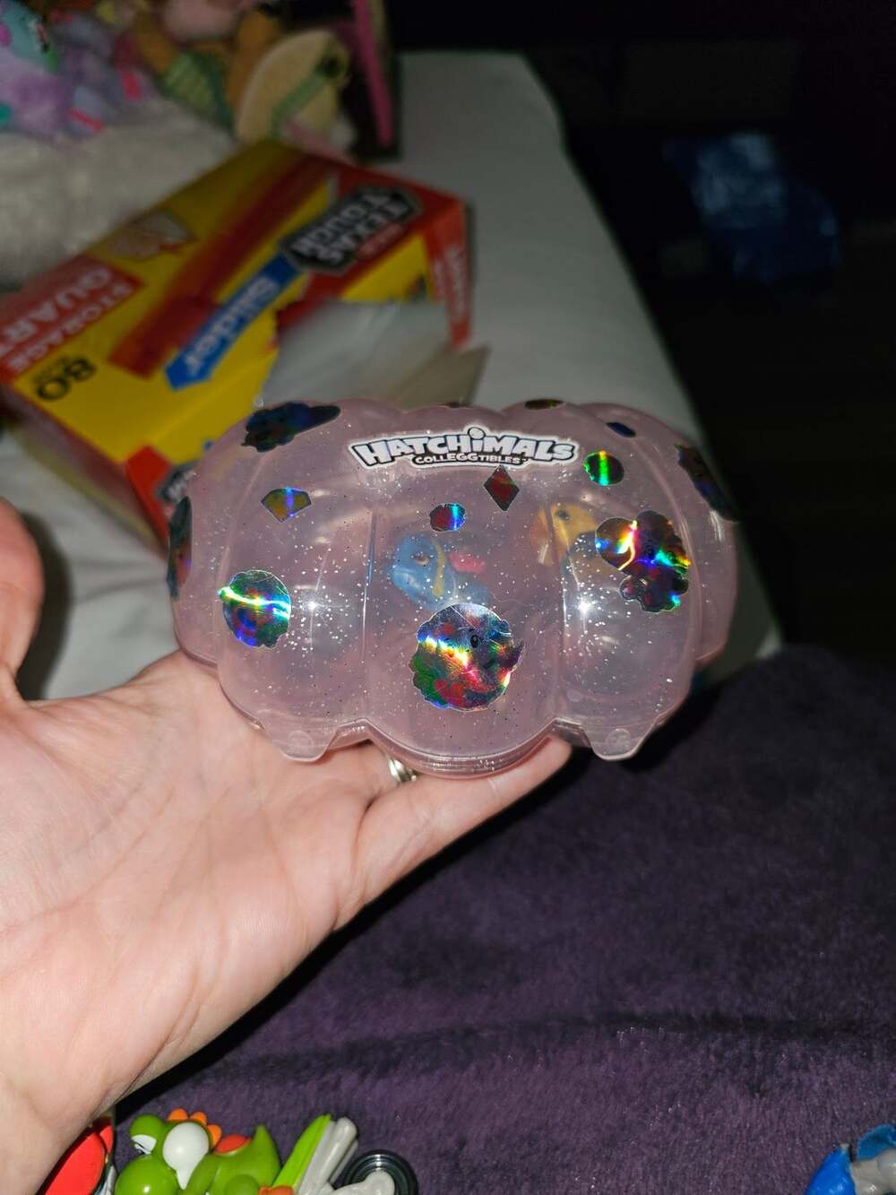 Hatchimals CollEGGtibles Mermal Magic Shell Case with some figures and nests.